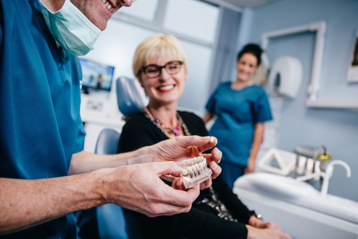 Patient smiling after All-on-4 dental implants in Frome