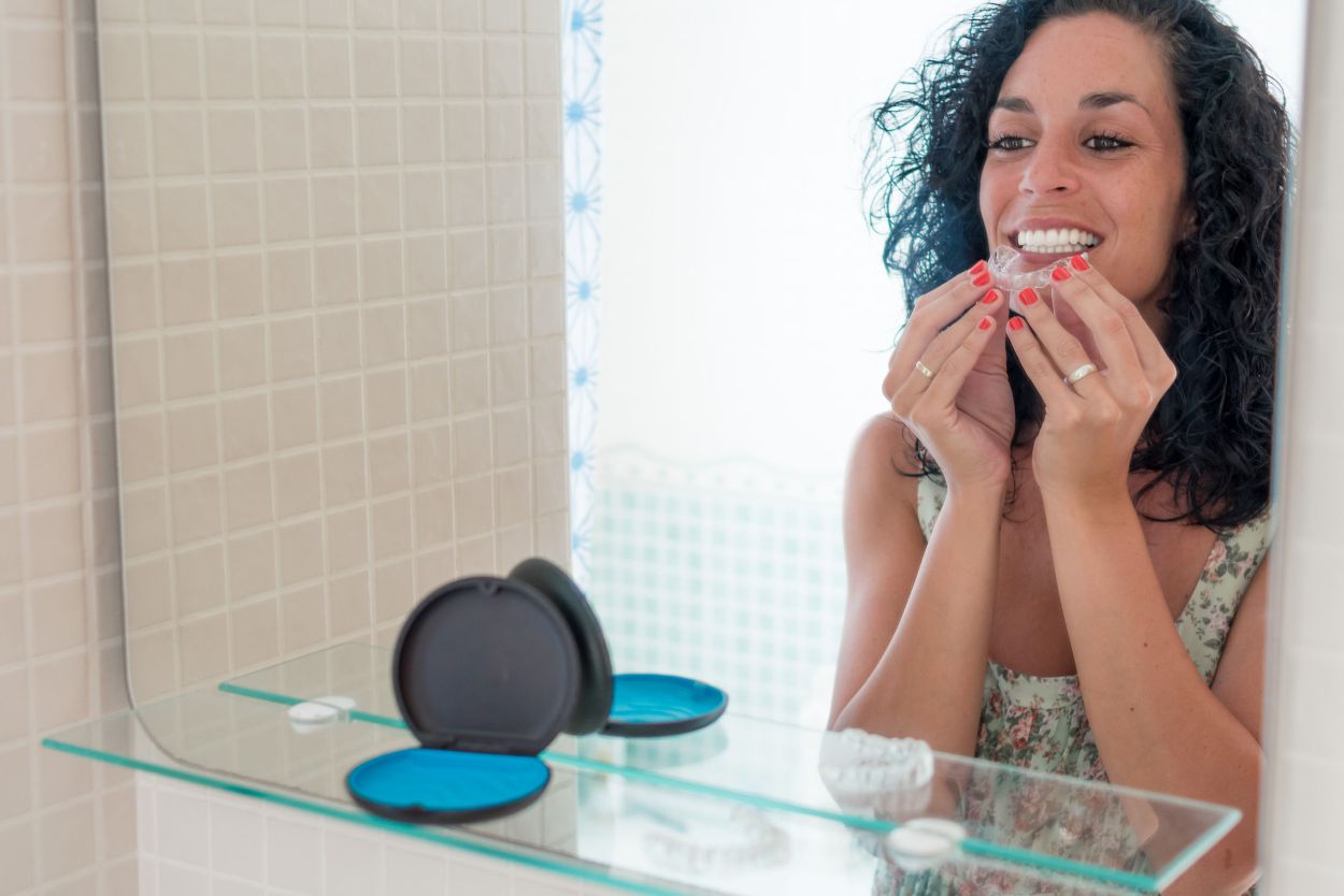 Patient wearing Invisalign clear aligners